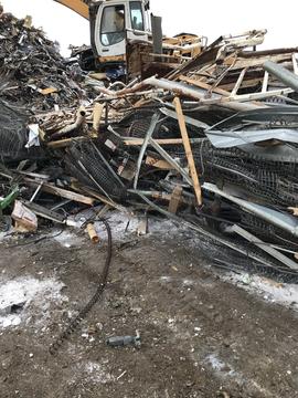 Scrap Metal Prices | Pile of Recycled Metal and Scrap Equipment