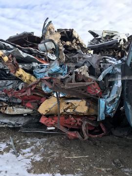 Scrap Metal Prices | Junk Cars and Scrap Metal Piled for Recycling