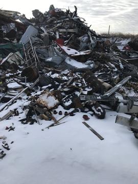 Scrap Metal Prices | Pile of Scrap Metal and Junk Cars in Winter