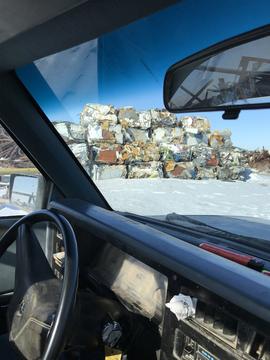 Scrap Metal Prices | Stacked Scrap Metal Ready for Recycling